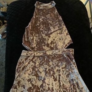 Velvet tan dress that goes right above the knees, with cut outs on the sides